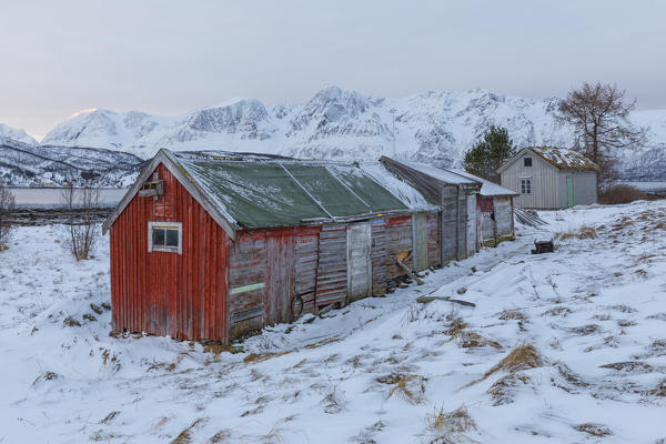 Fishermans houses. Storsteinnes, Balsfjorden, Lyngen Alps, Troms, Norway, Lapland, Europe.