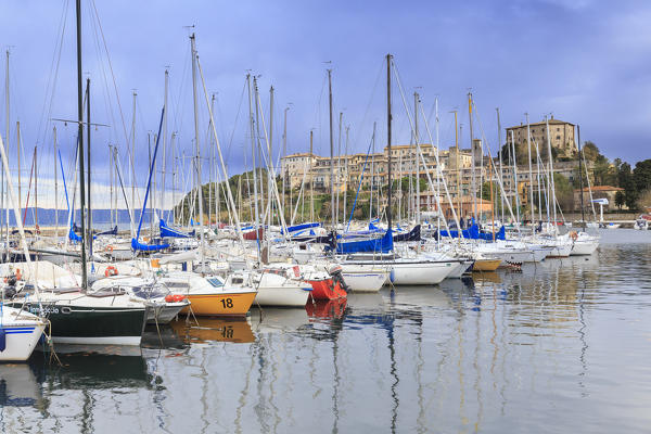 Capodimonte tourist port with black clouds in the sky. Capodimonte, Bolsena Lake, Viterbo province, Lazio, Italy