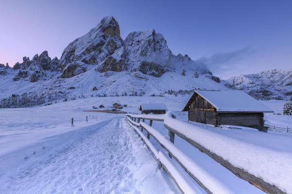 First colors of sunrise at the foot of Sass de Putia. Erbe Pass, Funes Valley, South Tyrol, Dolomites, Italy