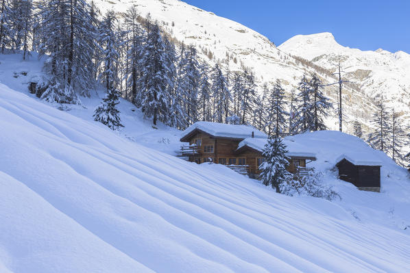 Hut not illuminated by the sun in Zermatt, Canton of Valais / Wallis, Switzerland.