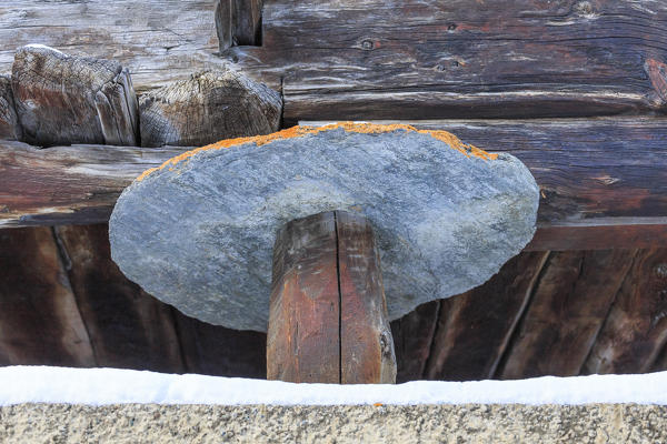 Mushroom pillar of a traditional Walser house in the historic center of Zermatt,  Canton of Valais / Wallis, Switzerland.