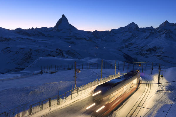 The train arrived at the summit at Gornergrat during twilight. Gornergrat, Zermatt, Canton of Valais / Wallis, Switzerland.