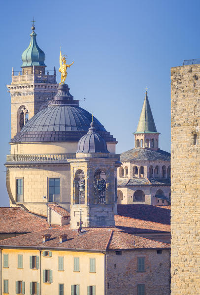 Golden statue of Sant'Alessandro, patron saint of the city, on the top of Bergamo Cathedral (Dome). Bergamo, Lombardy, Italy.