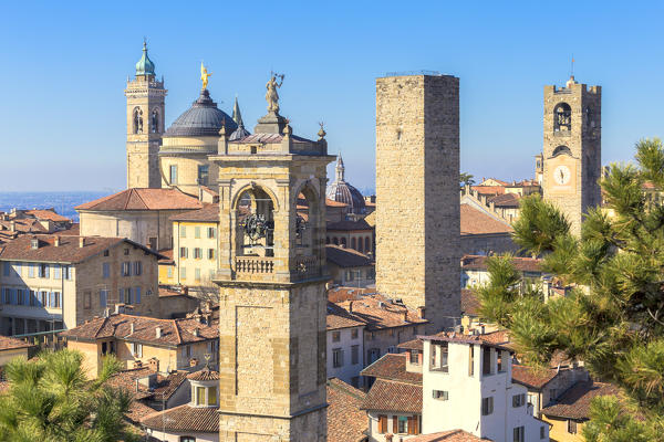 Tower bell of San Pangrazio, Torre del Gombito (Gombito tower), Sant'Alessandro Cathedral (Dome) and Civic Tower(Campanone). Bergamo (Upper town), Lombardy, Italy.