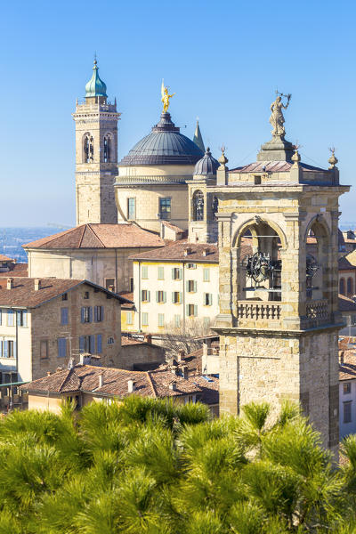 Tower bell of San Pangrazio and Sant'Alessandro Cathedral(Dome). Bergamo(Upper town), Lombardy, Italy.