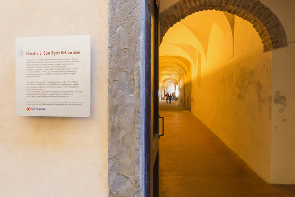 People visit the Cloister of Sant'Agata of Carmine(Chiostro di Sant'Agata del Carmine). Bergamo(Upper Town), Lombardy, Italy.