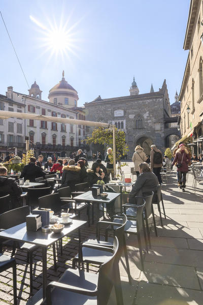 Tables of a bar in the Piazza Vecchia. Bergamo, Lombardy, Italy.