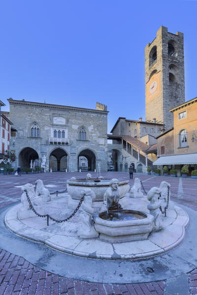 Piazza Vecchia with civic tower and Fontana del Contarini. Bergamo(Upper Town), Lombardy, Italy.