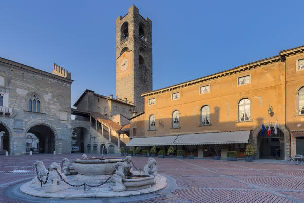 Piazza Vecchia with civic tower and Fontana del Contarini. Bergamo(Upper Town), Lombardy, Italy.