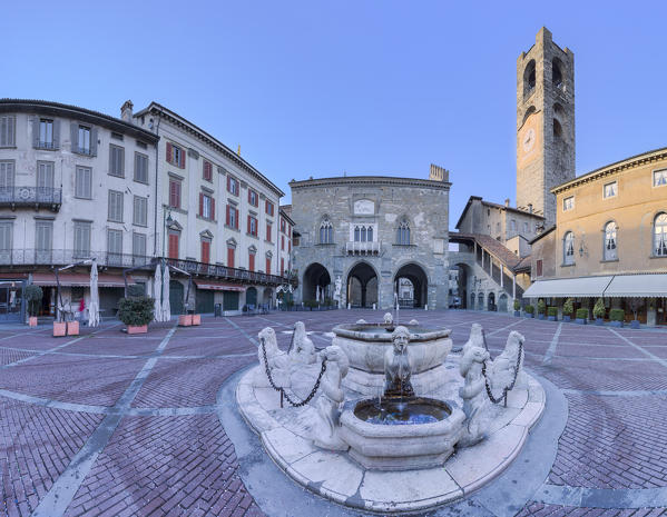Piazza Vecchia with civic tower and Fontana del Contarini. Bergamo(Upper Town), Lombardy, Italy.
