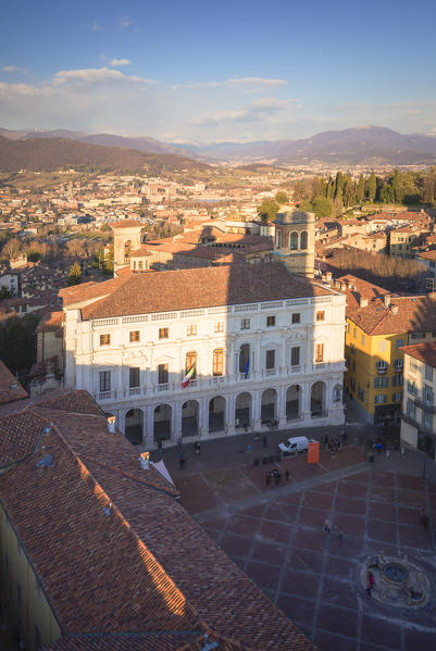 Piazza Vecchia and Palazzo Nuovo (New Palace) from above during sunset. Bergamo, Lombardy, Italy.