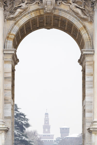 Sforza Castle from the central window of the Arch of Peace. Milan, Lombardy, Northern Italy, Italy.