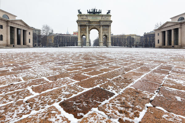 Arch of Peace after a snowfall. Milan, Lombardy, Northern Italy, Italy.