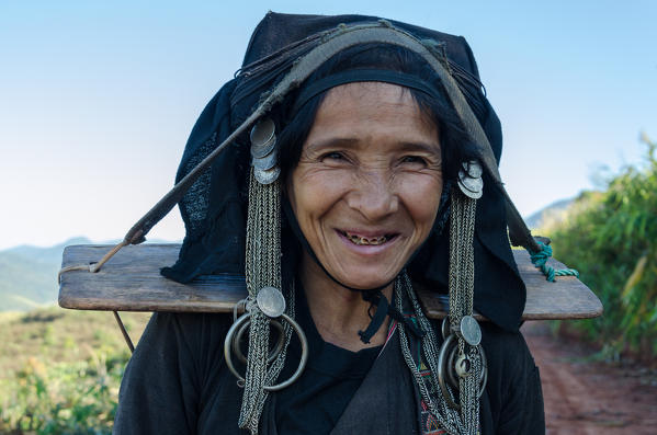 Phongsali, Laos. Portrait of an Hakka woman wearing a traditional hat.