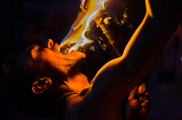 Kandy, Central Province, Sri Lanka, Southern Asia. A flaming moment of the 