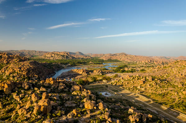 Hampi, Karnataka, India, Asia. A view of the ruing of the UNESCO World Heritage Site Hampi at sunset.