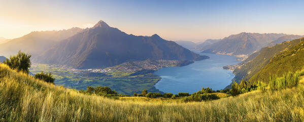 Panoramic view on lake Como (Alto Lario) with Domaso, Colico, Legnone mount and Legnoncino mount on the background, from Sorico village. Como province, Lombardy, Italy, Europe