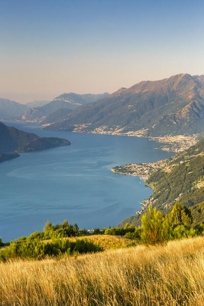 Morning view on lake Como (Alto Lario) with Domaso, Crocetta mount, Bregagno mount and Sasso di Musso mount on the background, from Sorico village. Como province, Lombardy, Italy, Europe