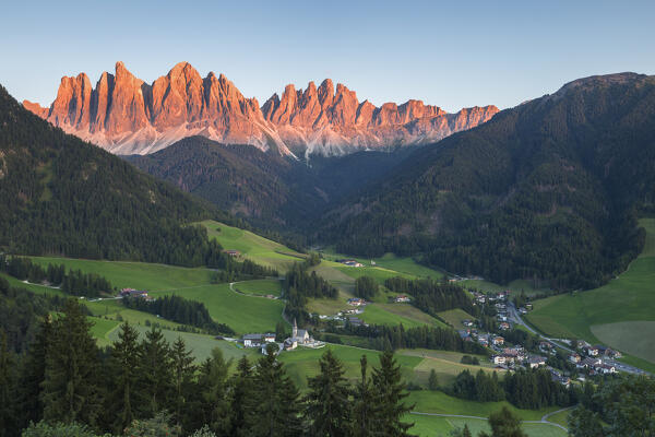 Sunset on Funes valley (val di Funes) in a summer time, enrosadira on Odle Dolomites, Santa Magdalena village, Bolzano province, South Tyrol, Trentino alto adige, Italy, Europe