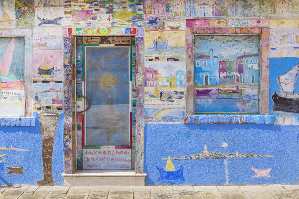Drawings on a house wall, Burano island, Venice, Veneto, Italy, Europe