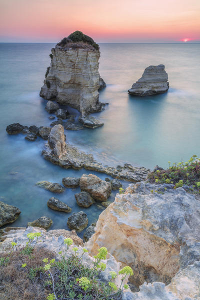 Melendugno, province of Lecce, Salento, Apulia, Italy. The Faraglioni in Torre Sant'Andrea