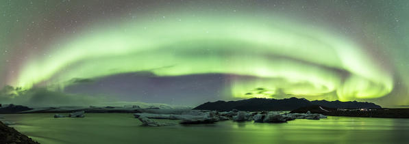 Jokulsarlon, Eastern Iceland, Iceland, Northern Europe. Northern lights over the glacier lagoon