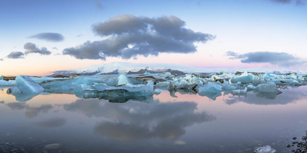 Jokulsarlon, Eastern Iceland, Iceland, Northern Europe. The iconic little icebergs lined in the glacier lagoon during a sunrise