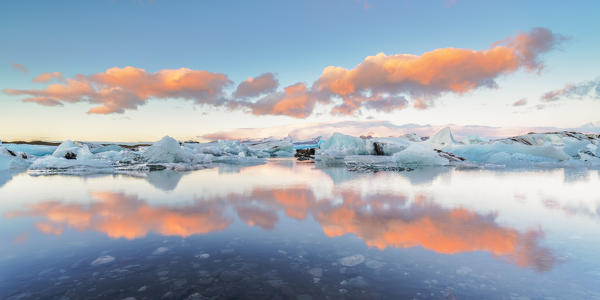 Jokulsarlon, Eastern Iceland, Iceland, Northern Europe. The iconic little icebergs lined in the glacier lagoon during a sunrise