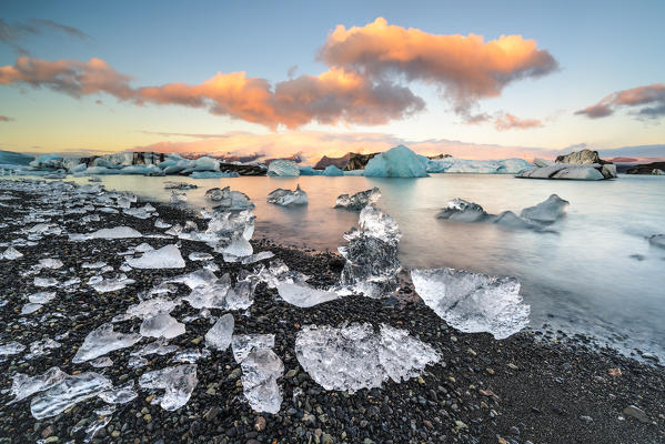 Jokulsarlon, Eastern Iceland, Iceland, Northern Europe. The iconic little icebergs lined in the glacier lagoon during a sunrise