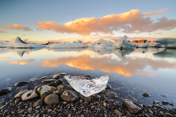 Jokulsarlon, Eastern Iceland, Iceland, Northern Europe. The iconic little icebergs lined in the glacier lagoon during a sunrise