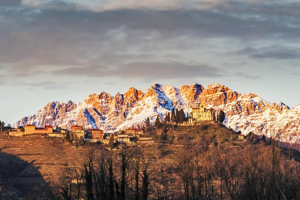 The church of Montevecchia at sunset. Resegone mountain in the background. Montevecchia, Lecco, Lombardy, Italy, Europe.