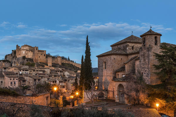 Alquezar village and Colegiata de Santa María la Mayor at dusk. Alquezar, Huesca, Spain, Europe