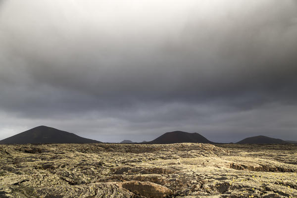 Stormy clouds on Fire Mountains, Timanfaya National Park, Lanzarote, Canary Islands, Spain