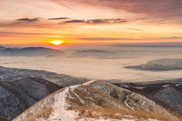 Overviewed of Brianza covered by the fog from Bollettone Mount, Como province, Lombardy, Italy