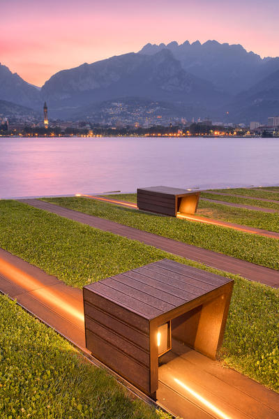 sunrise on the lakeside in front of Lecco, lecco province, lombardy, north italy, italy