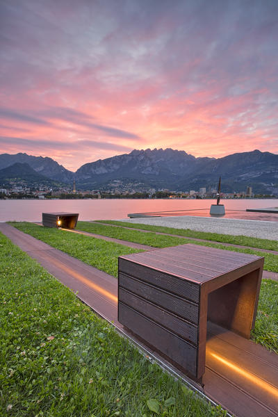 sunrise on the lakeside in front of Lecco,Malgrate, lecco province, lombardy, north italy, italy