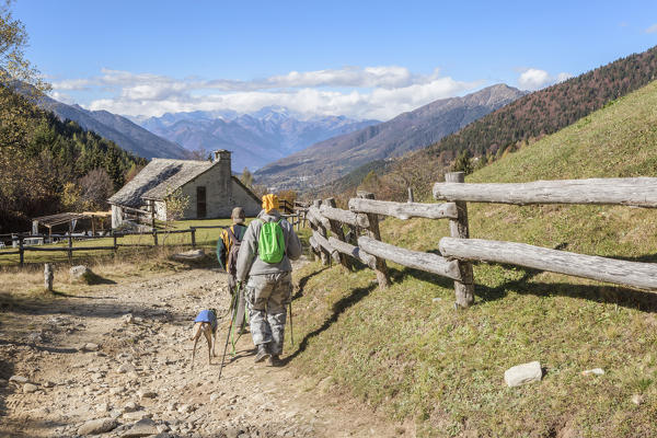 people walking on a pathway of Alpe Blitz, Val Vigezzo, Verbano Cusio Ossola province, Piedmont, North italy, Italy