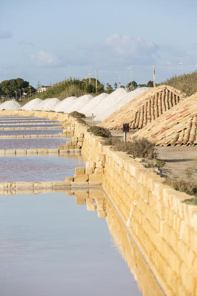 pyramids of salt drying along the salt pans of Marsala, Trapani province,Sicily,Italy