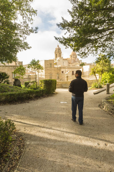 Tourist walking in Balio gardens, Erice, Trapani province, Sicily, Italy