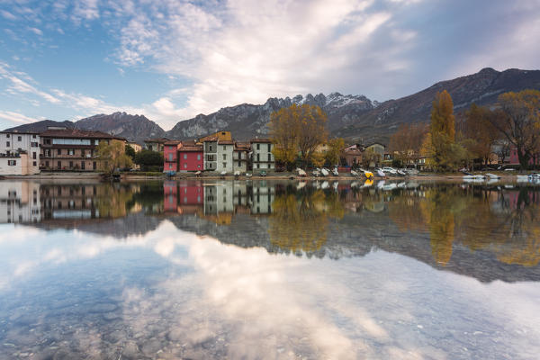 Pescarenico and Resegone mount reflected in the river Adda, Lecco, Lecco province, Lombardy, Italy