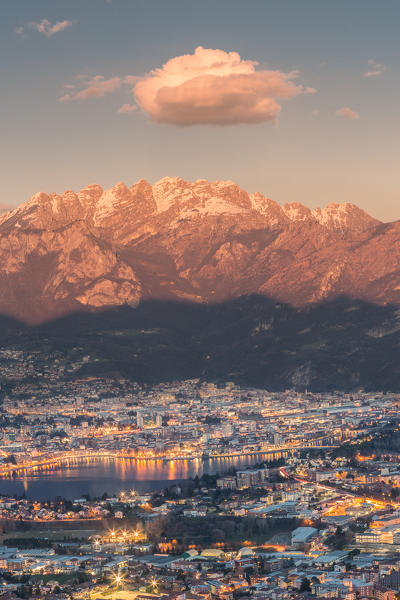 Lecco province at sunset with Resegone mount in the background viewed from San Tomaso,Valmadrera, Lecco province, Lombardy, Italy
