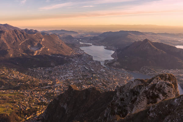 Overview of Lecco Lake and Adda river from Coltignone mount at dusk, Lecco Province, lombardy, italy