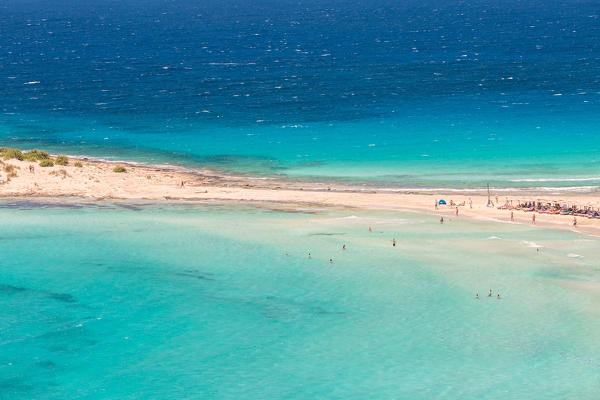The narrow stretch of white sand which divides Simos beach, Elafonissos, Laconia Region, Peloponnese, Greece