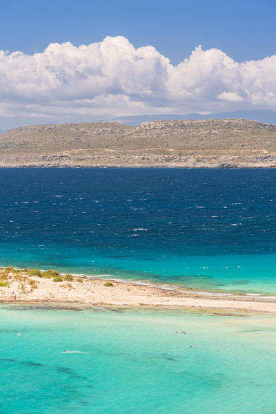 The narrow stretch of white sand which divides Simos beach, Elafonissos, Laconia Region, Peloponnese, Greece