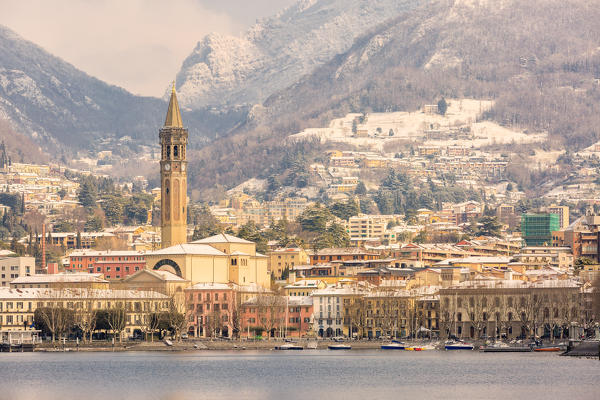 Snowy city of Lecco viewed from the lakefront of Malgrate, Lecco province, Lombardy, Italy