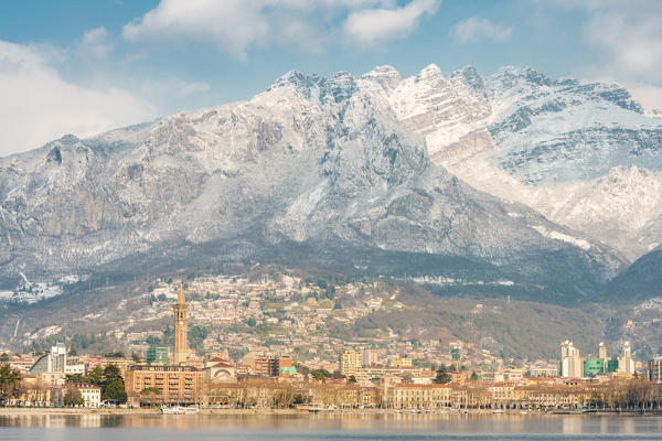 Lecco city and Resegone mount in the background viewed from Malgrate lakefront, Lecco province, Lombardy, italy