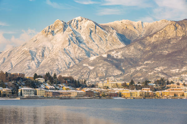 Malgrate village framed by the snowy peaks of Monte Rai and Corno Birone, Malgrate, Lecco province, Lombardy, italy