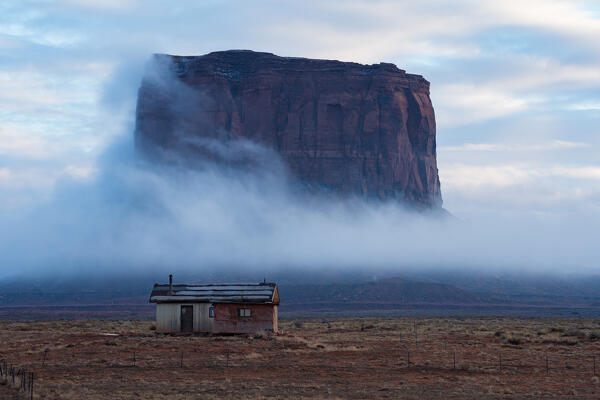 Foggy sunset in Monument Valley Tribal Park, Utah, Usa
