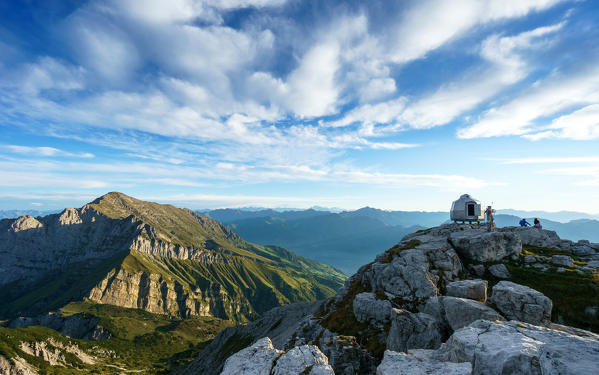 Bivacco Ferrario and in the background Grigna Settentrionale seen from the summit of Grigna Meridionale, Lecco, Lombardy, Italy, Europe