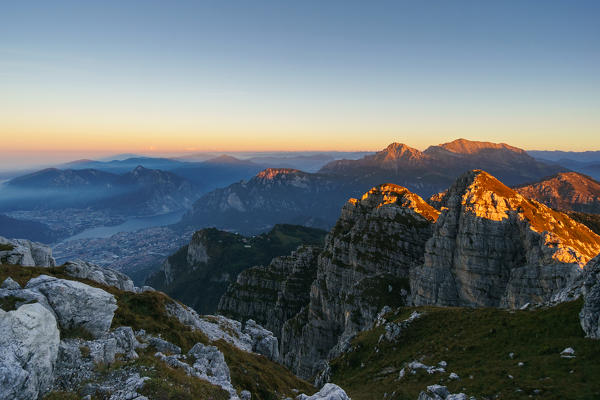 View of Lecco and Grigne Group from the summit of Resegone at sunrise, Lecco, Lombardy, Alps, Italy, Europe